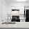 a kitchen with white cabinets