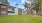 a building with a grass yard