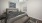 a bedroom with a ceiling fan