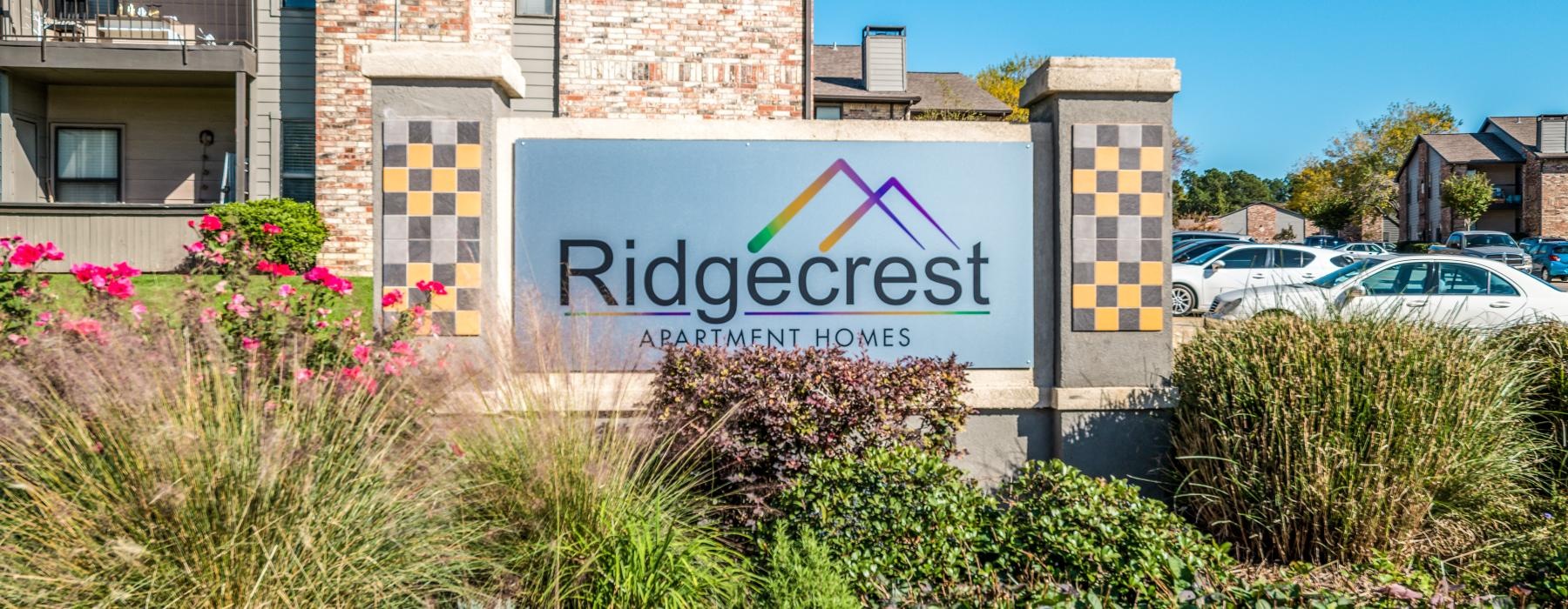 a sign in front of a building