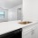 a bathroom with a sink and cabinets
