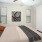a bedroom with a bed and a fan