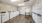 a laundry room with white washer and dryers