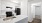 a kitchen with white cabinets