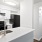 a kitchen with white cabinets